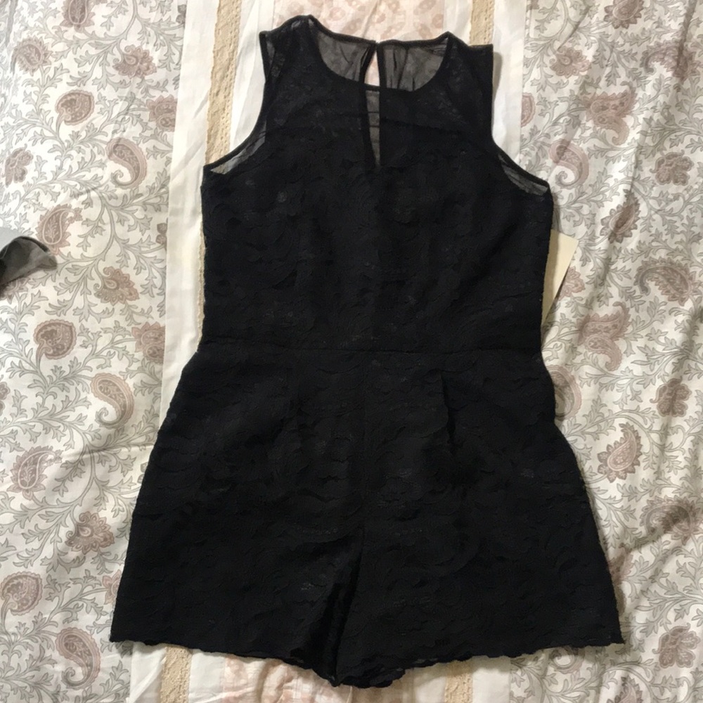 Elegant Black Lace Romper with Jewel Neckline